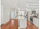 Well-appointed kitchen featuring a spacious island, modern appliances, and stylish pendant lighting at 554 Amalfi Dr, Davidson, NC 28036
