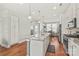 Modern kitchen with granite countertops, stainless steel appliances, and an open layout at 554 Amalfi Dr, Davidson, NC 28036