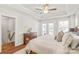 Spacious main bedroom with large bed and access to the balcony at 554 Amalfi Dr, Davidson, NC 28036