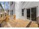 Wooden deck area with sliding glass door and railing offering outdoor relaxation at 606 Saint Cloud Dr, Statesville, NC 28625