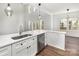 Open-concept kitchen features a large island, stainless steel dishwasher, and modern pendant lights at 606 Saint Cloud Dr, Statesville, NC 28625