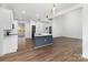 Modern kitchen with a large island, stainless steel appliances, and ample counter space for cooking at 606 Saint Cloud Dr, Statesville, NC 28625