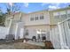 Home's backyard with patio area, fencing, and air conditioning unit at 6738 Rothchild Dr, Charlotte, NC 28270