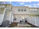Home's backyard with patio area, fencing, air conditioning unit at 6738 Rothchild Dr, Charlotte, NC 28270
