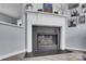 Elegant fireplace with a decorative mantel, offering a cozy focal point for the living space at 6738 Rothchild Dr, Charlotte, NC 28270