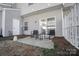 Cozy patio area with sliding glass door, seating, and outdoor space at 6738 Rothchild Dr, Charlotte, NC 28270