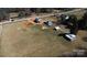 Expansive aerial view of a property showcasing multiple outbuildings on a large lot, offering ample space at 850 Dunns Mountain Church Rd # 1, Salisbury, NC 28146