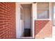 Exterior entrance to unfinished basement with brick border and white door at 850 Dunns Mountain Church Rd # 1, Salisbury, NC 28146
