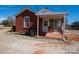 Brick home featuring a covered side porch and a cozy entrance at 850 Dunns Mountain Church Rd # 1, Salisbury, NC 28146