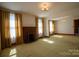 Spacious living room featuring a brick fireplace at 850 Dunns Mountain Church Rd # 1, Salisbury, NC 28146