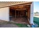Unfinished interior of an outbuilding with exposed wood frame and open sliding door at 850 Dunns Mountain Church Rd # 1, Salisbury, NC 28146