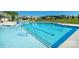 A refreshing community pool with lounge chairs and clear blue water offers a great place to relax and enjoy the summer sun at 878 Two Brothers Ln, York, SC 29745