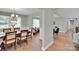 Elegant dining room seamlessly connects to a cozy living area with light walls and lots of light at 905 Blalock Dr, Kings Mountain, NC 28086