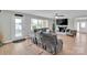 Relax in the living room with fireplace, large windows, and modern finishes that is perfect for entertaining guests at 905 Blalock Dr, Kings Mountain, NC 28086