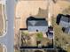 Aerial view of a property highlighting its fenced backyard, gazebo, and surrounding landscape at 9100 Clancy Pl, Charlotte, NC 28227