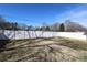 Large fenced backyard with plenty of space and a well-maintained perimeter, perfect for outdoor activities at 9100 Clancy Pl, Charlotte, NC 28227