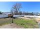 Large backyard with grass and a patio at 9100 Clancy Pl, Charlotte, NC 28227