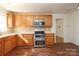Eat in kitchen featuring stainless steel appliances, cabinets and countertops at 9100 Clancy Pl, Charlotte, NC 28227