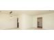 Living room showcasing a carpeted floor, neutral walls, and modern lighting fixture, creating a versatile space at 9100 Clancy Pl, Charlotte, NC 28227