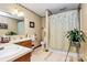 Bathroom with a double vanity and shower-tub combo at 1069 W Rebound Rd, Van Wyck, SC 29720