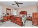 Comfortable bedroom with natural light and wooden furniture at 1069 W Rebound Rd, Van Wyck, SC 29720