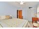 Comfortable bedroom featuring a ceiling fan and a charming quilt bedding set at 1069 W Rebound Rd, Van Wyck, SC 29720