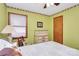Bedroom with green walls, a ceiling fan, and dresser at 1069 W Rebound Rd, Van Wyck, SC 29720