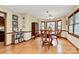 Dining room with hardwood floors, display cabinet, and bay window at 1069 W Rebound Rd, Van Wyck, SC 29720