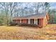 This brick home has black shutters and nice landscaping at 1069 W Rebound Rd, Van Wyck, SC 29720