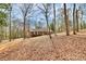 A beautiful ranch style home is surrounded by a forest of mature hardwoods and a long private drive at 1069 W Rebound Rd, Van Wyck, SC 29720