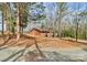 A home nestled in the trees surrounded by a forest of mature hardwoods at 1069 W Rebound Rd, Van Wyck, SC 29720