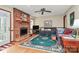 A cozy living room featuring a fireplace and hardwood floors at 1069 W Rebound Rd, Van Wyck, SC 29720