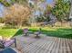 Wooden deck area with comfortable patio furniture, great for outdoor entertaining at 111 Oakwood Dr, Kings Mountain, NC 28086