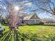 Lush backyard with a spacious wooden deck area for relaxing and enjoying the outdoors at 111 Oakwood Dr, Kings Mountain, NC 28086