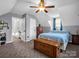 Cozy bedroom featuring a ceiling fan, natural light, and a comfortable bed at 111 Oakwood Dr, Kings Mountain, NC 28086