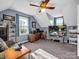 Well-lit bedroom featuring neutral paint, ceiling fan, wood furniture, and bright sunlight, perfect for relaxing at 111 Oakwood Dr, Kings Mountain, NC 28086