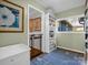Bright hallway featuring a storage cabinet and window at 111 Oakwood Dr, Kings Mountain, NC 28086