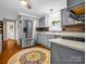 Charming kitchen with stainless steel appliances, gray cabinets, and decorative backsplash at 111 Oakwood Dr, Kings Mountain, NC 28086