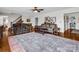 Comfortable living room with hardwood floors, plush sofas, a staircase and large area rug at 111 Oakwood Dr, Kings Mountain, NC 28086