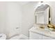 Bathroom featuring a modern vanity with gold hardware and stylish mirror at 1121 S Edgemont Ave, Gastonia, NC 28054