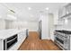 Spacious kitchen with stainless steel appliances and hardwood flooring at 1121 S Edgemont Ave, Gastonia, NC 28054