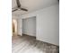Bedroom featuring hardwood floors and an open closet at 113 Galilean Rd, York, SC 29745