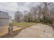 An expansive backyard featuring a wooden deck and ample space at 116 11Th St, Spencer, NC 28159