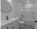 Modern bathroom with a vanity, updated faucet, and shower-tub combo at 116 11Th St, Spencer, NC 28159