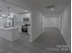 Stylish open-concept kitchen with stainless steel appliances and a view to the living area at 116 11Th St, Spencer, NC 28159