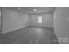 Bright living room with gray floors and recessed lighting at 116 11Th St, Spencer, NC 28159