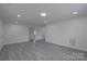Spacious living room with recessed lighting and neutral paint for a bright, airy feel at 116 11Th St, Spencer, NC 28159