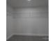 A spacious walk-in closet with installed wire shelving for optimal organization and storage at 116 11Th St, Spencer, NC 28159