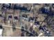 An aerial view of a home and neighborhood showing the property outlined in blue at 1200 Craig Ave, Lancaster, SC 29720