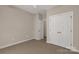 A simple bedroom with neutral tones, closet space, and carpeted floors at 1200 Craig Ave, Lancaster, SC 29720